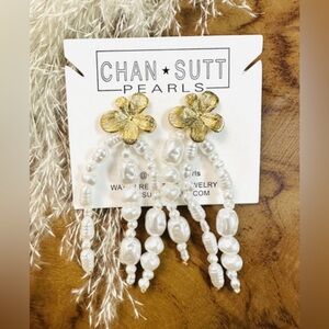 Chansutt Aloha Earrings, gold floral tops and cascading freshwater pearl drops.